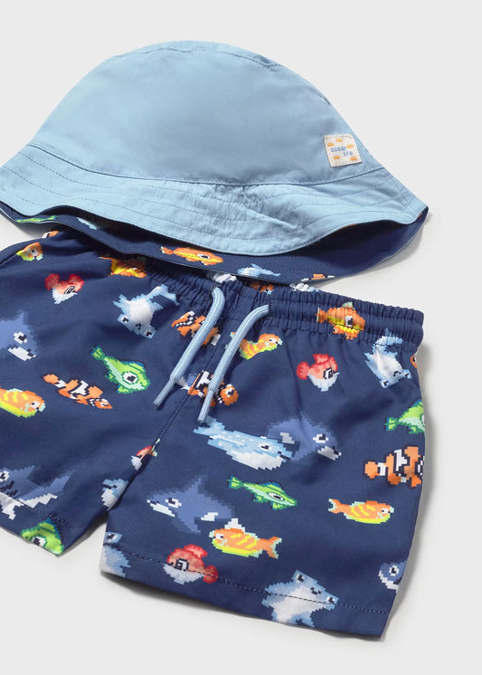Conjunto traje de baño y gorro reversible protección solar bebé